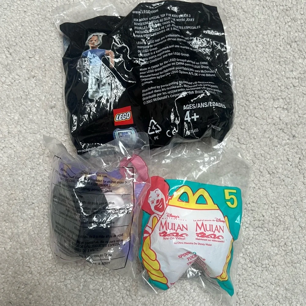 Three Sealed McDonald’s Happy Meal Toys